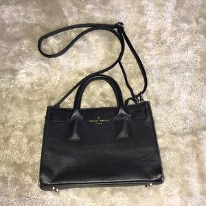 The muse Premium Paris cross black body hand bag